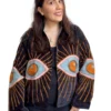 43 Lakshmi Jacket. Color negro con ojo protector